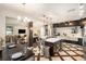 Open concept kitchen with dining area and modern finishes at 5701 S Macdill Ave, Tampa, FL 33611