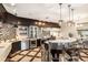 Modern kitchen with stainless steel appliances and breakfast bar at 5701 S Macdill Ave, Tampa, FL 33611