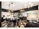 Modern kitchen with stainless steel appliances and a curved island at 5701 S Macdill Ave, Tampa, FL 33611
