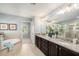 Large bathroom with granite countertop and soaking tub at 5701 S Macdill Ave, Tampa, FL 33611