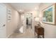 Upstairs hallway with decorative artwork and storage at 5701 S Macdill Ave, Tampa, FL 33611