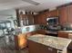 Kitchen boasts granite countertops and ample cabinetry at 8512 Fantasia Park Way, Riverview, FL 33578