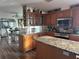 Kitchen boasts granite countertops and ample cabinetry at 8512 Fantasia Park Way, Riverview, FL 33578