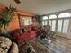 Spacious living room with hardwood floors and large windows at 8512 Fantasia Park Way, Riverview, FL 33578