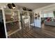 Living room with mirrored shelving and sectional sofa at 8512 Fantasia Park Way, Riverview, FL 33578