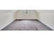 Simple bedroom with grey carpet and large window at 912 E 20Th Ave, Tampa, FL 33605