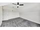 Spacious bedroom with grey carpet and ceiling fan at 912 E 20Th Ave, Tampa, FL 33605