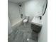 Modern bathroom with subway tile and floating vanity at 915 E 20Th Ave, Tampa, FL 33605