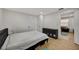 Bright bedroom with double bed and built-in shelving at 915 E 20Th Ave, Tampa, FL 33605