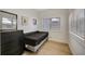 Small bedroom with twin bed and dresser at 915 E 20Th Ave, Tampa, FL 33605