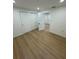 Light and airy bedroom with double doors and hardwood floors at 915 E 20Th Ave, Tampa, FL 33605