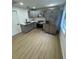 Modern kitchen with gray cabinets and stainless steel appliances at 915 E 20Th Ave, Tampa, FL 33605
