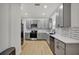 Modern kitchen with gray cabinets and stainless steel appliances at 915 E 20Th Ave, Tampa, FL 33605