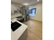 Modern kitchen with gray cabinets and stainless steel appliances at 915 E 20Th Ave, Tampa, FL 33605