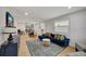Open concept living room and dining area with light flooring at 915 E 20Th Ave, Tampa, FL 33605