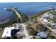 Aerial view of waterfront lot, perfect for new construction at 96 Shore Dr, Tarpon Springs, FL 34689