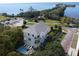 Coastal home with pool, private backyard, and stunning water views at 96 Shore Dr, Tarpon Springs, FL 34689
