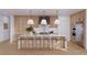 Modern kitchen with light wood cabinets and large island at 96 Shore Dr, Tarpon Springs, FL 34689