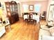 Bright dining area featuring a round table and a large china cabinet at 9790 66Th N St # 248, Pinellas Park, FL 33782