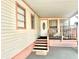 Steps leading to the entrance of a manufactured home with a covered porch at 9790 66Th N St # 248, Pinellas Park, FL 33782
