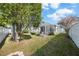 Spacious backyard with a screened patio and grassy area at 10038 Reagan Dairy Trl, Bradenton, FL 34212
