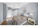 Comfortable bedroom with wood floors and direct access to the bathroom at 10038 Reagan Dairy Trl, Bradenton, FL 34212