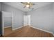 Bright bedroom with ceiling fan and walk-in closet at 10038 Reagan Dairy Trl, Bradenton, FL 34212