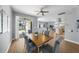 Open dining room with a view of the living area and kitchen at 10038 Reagan Dairy Trl, Bradenton, FL 34212