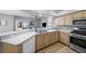 Updated kitchen with stainless steel appliances and light wood cabinetry at 10038 Reagan Dairy Trl, Bradenton, FL 34212