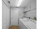 Laundry room with washer, dryer, and shelving at 10038 Reagan Dairy Trl, Bradenton, FL 34212