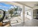 Spacious screened patio with seating area at 10038 Reagan Dairy Trl, Bradenton, FL 34212