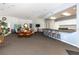 Community room with kitchenette, tables, chairs, and a TV at 10764 70Th Ave # 1303, Seminole, FL 33772