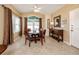 Bright dining area with wood table and four chairs at 10764 70Th Ave # 1303, Seminole, FL 33772