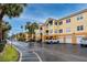 Two-story building with attached garages and ample parking at 10764 70Th Ave # 1303, Seminole, FL 33772
