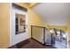 Exterior view showing stairs leading to condo entrance with a balcony at 10764 70Th Ave # 1303, Seminole, FL 33772