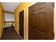 Hallway with doors to different units in the building at 10764 70Th Ave # 1303, Seminole, FL 33772