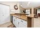 Kitchen with granite countertops and white cabinets at 10764 70Th Ave # 1303, Seminole, FL 33772