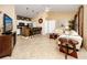 Living room with kitchen, island, and seating area at 10764 70Th Ave # 1303, Seminole, FL 33772