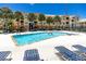 Inviting pool with plenty of lounge chairs at 10764 70Th Ave # 1303, Seminole, FL 33772