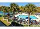 Relaxing pool area with surrounding lounge chairs at 10764 70Th Ave # 1303, Seminole, FL 33772