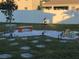 Landscaped backyard with stone pathway and garden at 10913 Kidron Valley Ln, Tampa, FL 33625