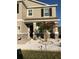 Landscaped front yard with palm trees and white rock at 10913 Kidron Valley Ln, Tampa, FL 33625