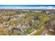 Aerial view of house and surrounding neighborhood at 14721 Condor Pass, Clearwater, FL 33760