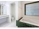 Bathroom with vanity, toilet, and bathtub at 14721 Condor Pass, Clearwater, FL 33760