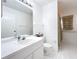Bathroom with single sink vanity, shower/tub combo, and tile floor at 14721 Condor Pass, Clearwater, FL 33760