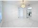 Bright dining room with tile flooring and view into kitchen at 14721 Condor Pass, Clearwater, FL 33760