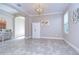 Elegant dining room featuring hardwood floors and a chandelier at 17721 Bright Wheat Dr, Lithia, FL 33547