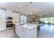 Open concept kitchen with island and stainless steel appliances at 17721 Bright Wheat Dr, Lithia, FL 33547