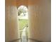 View from inside the building looking out at the pool and grounds at 214 Elmwood Cir # 214, Seminole, FL 33777
