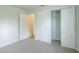Spacious bedroom with neutral decor and a large closet at 2369 N Biscayne Dr, North Port, FL 34291
